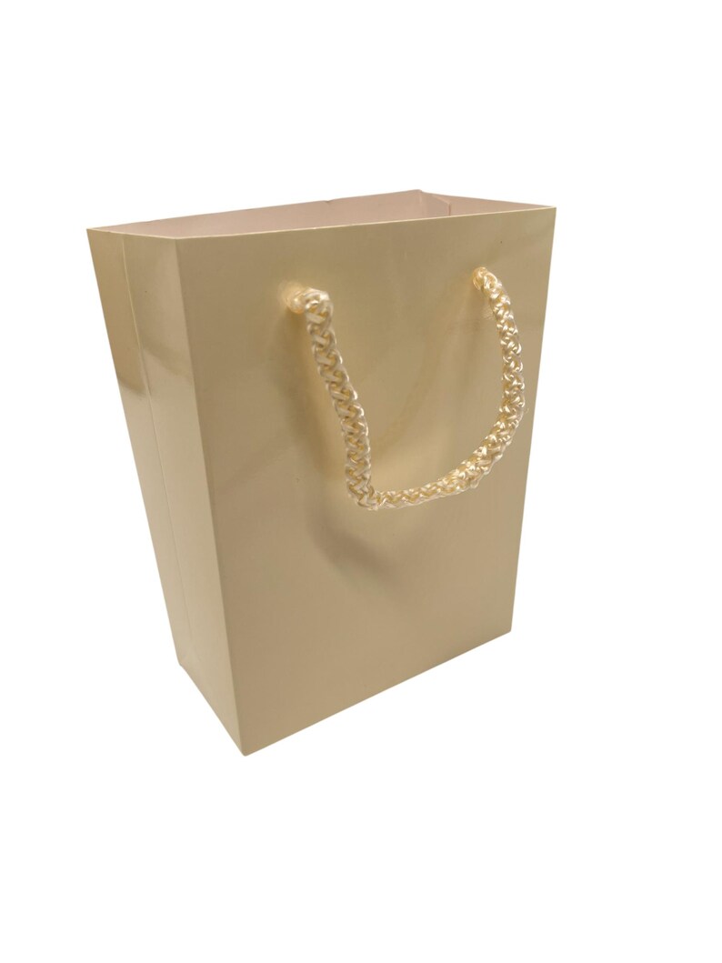 Yellow gift bag with rope handles — 10 x 14 x 5 cm